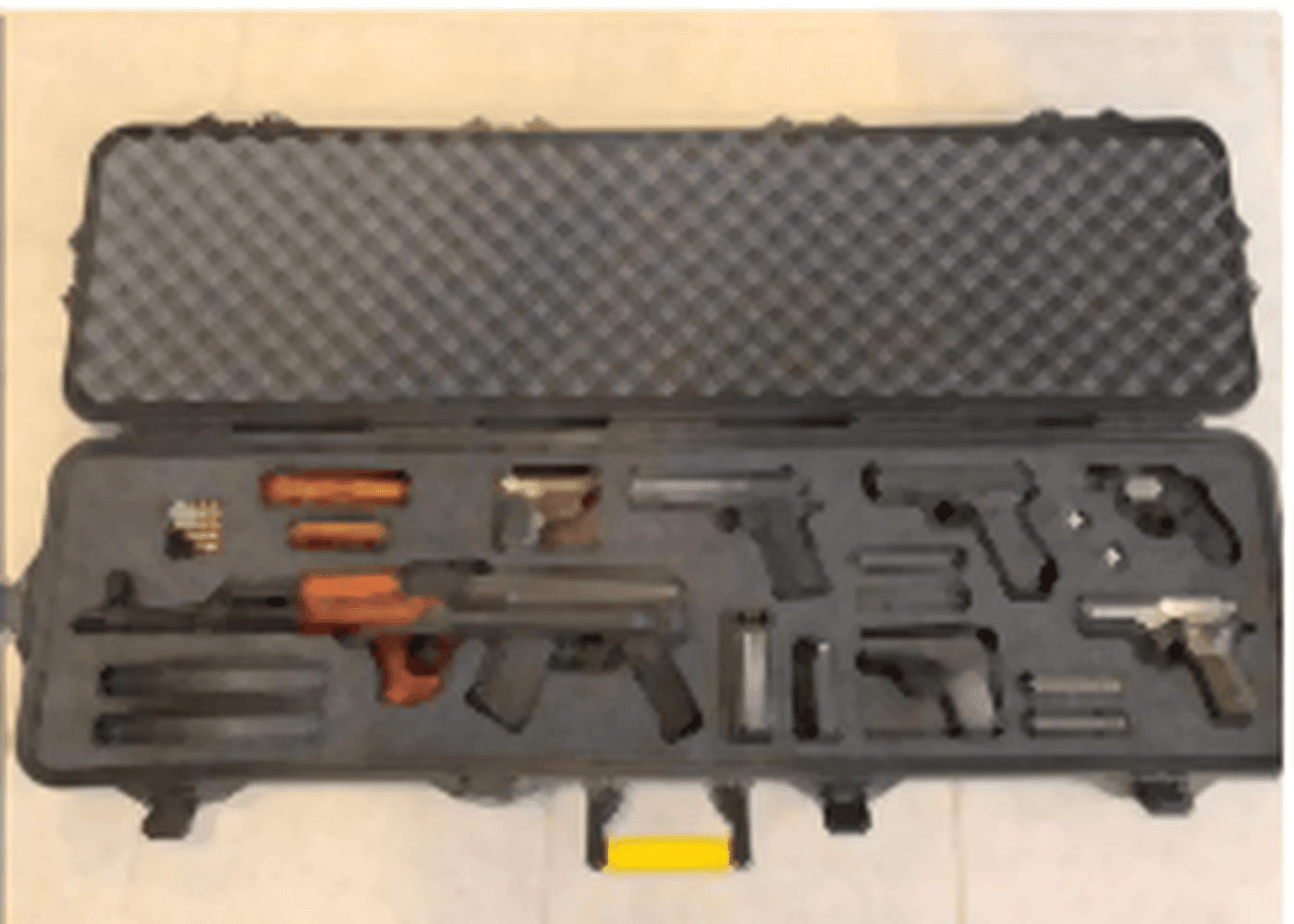 Long equipment case with fitted EVA foam compartments